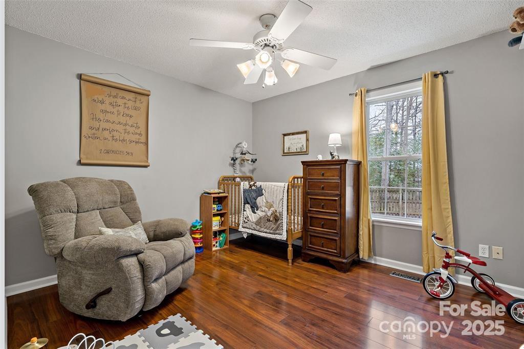 2691 Laurel Point Drive Nebo, NC 28761 - Photo 26 of 44 a living room with furniture and a flat screen tv