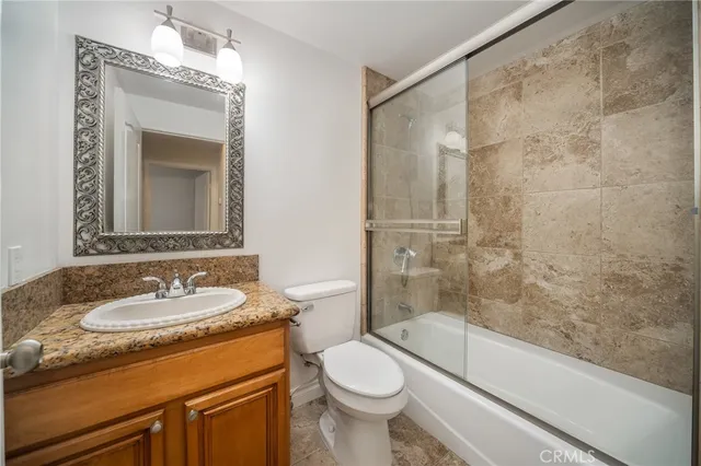 a view of an empty room with stairs