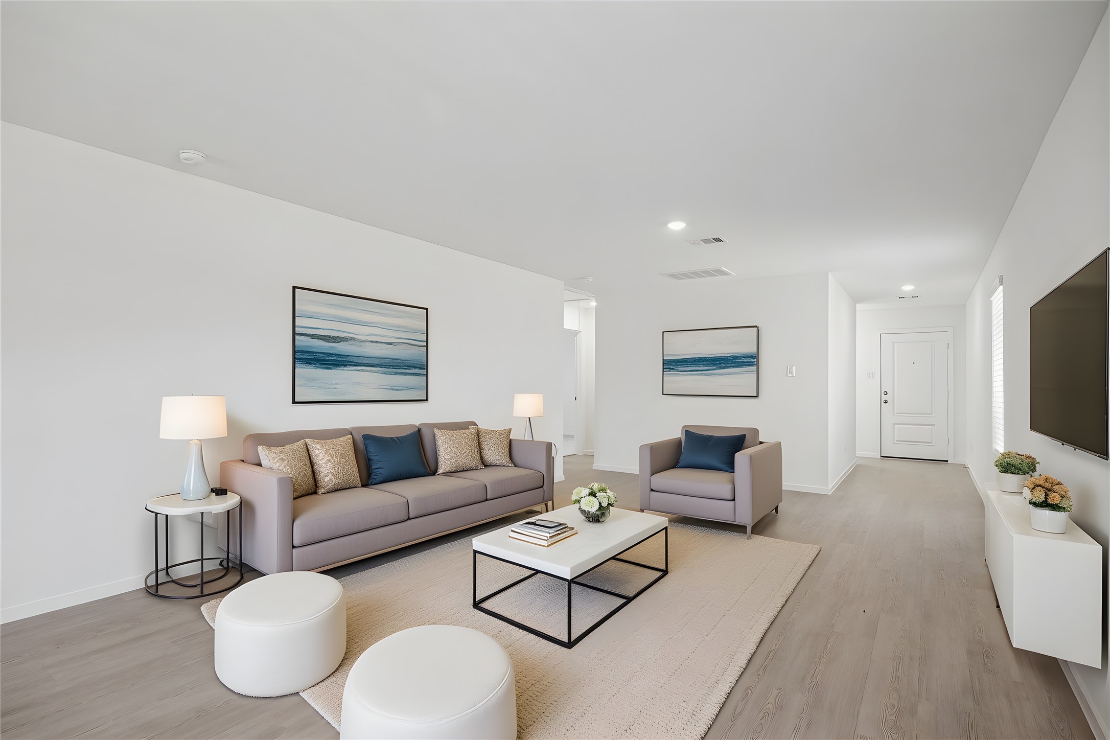 18015 Trepito Avenue New Caney, TX 77357 - Photo 1 of 14 a living room with furniture and a flat screen tv