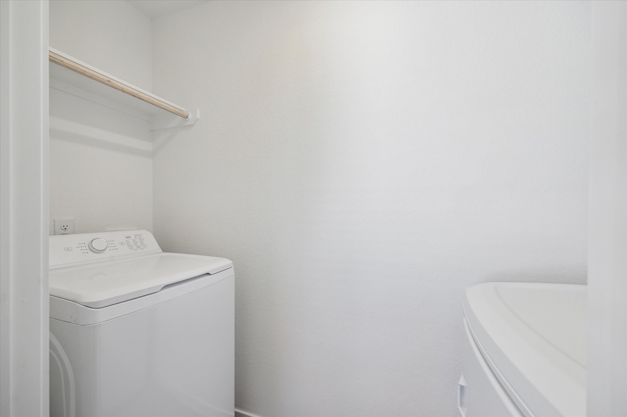 18015 Trepito Avenue New Caney, TX 77357 - Photo 12 of 14 a utility room with dryer and washer