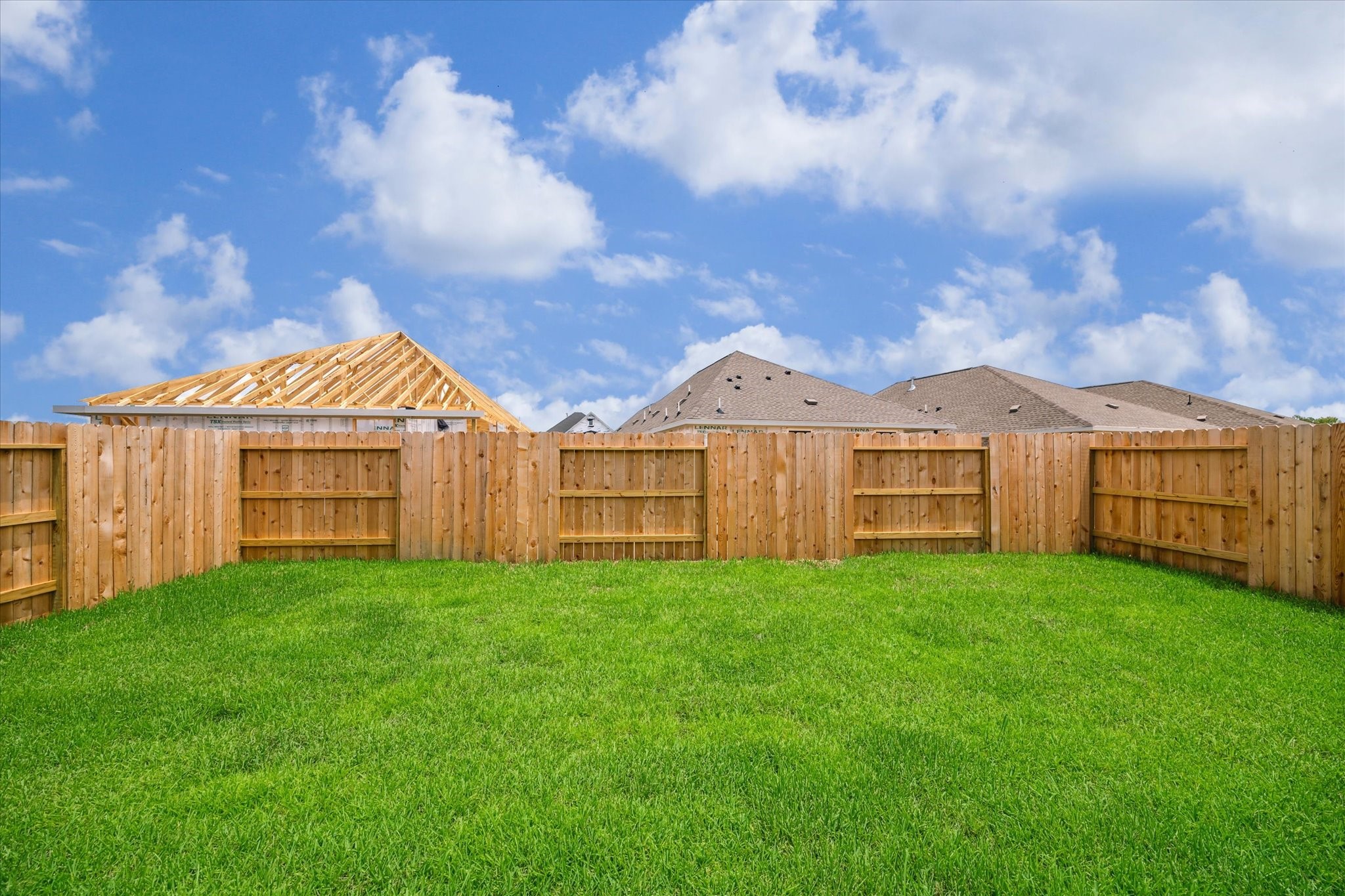 18015 Trepito Avenue New Caney, TX 77357 - Photo 13 of 14 a view of yard with house in the background