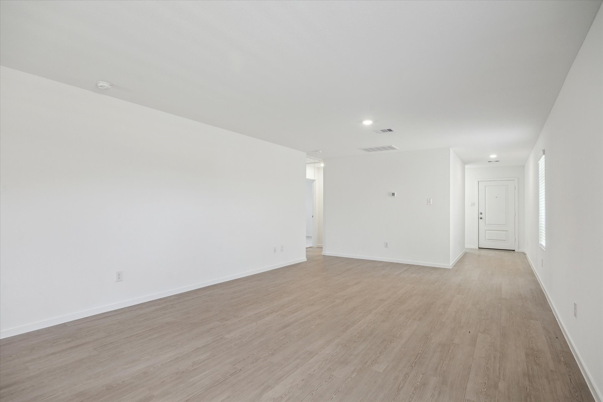 18015 Trepito Avenue New Caney, TX 77357 - Photo 2 of 14 a view of an empty room