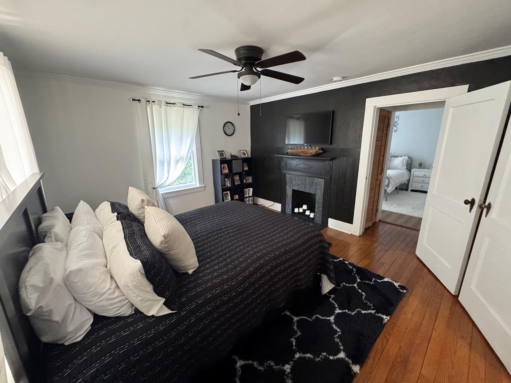 4367 Old Macon Road Columbus, GA 31907 - Photo 13 of 32 a bed room with a bed window and a television