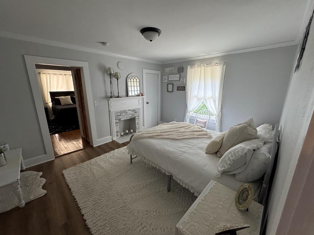 4367 Old Macon Road Columbus, GA 31907 - Photo 18 of 32 a bedroom with a bed and a flat tv screen on the dresser