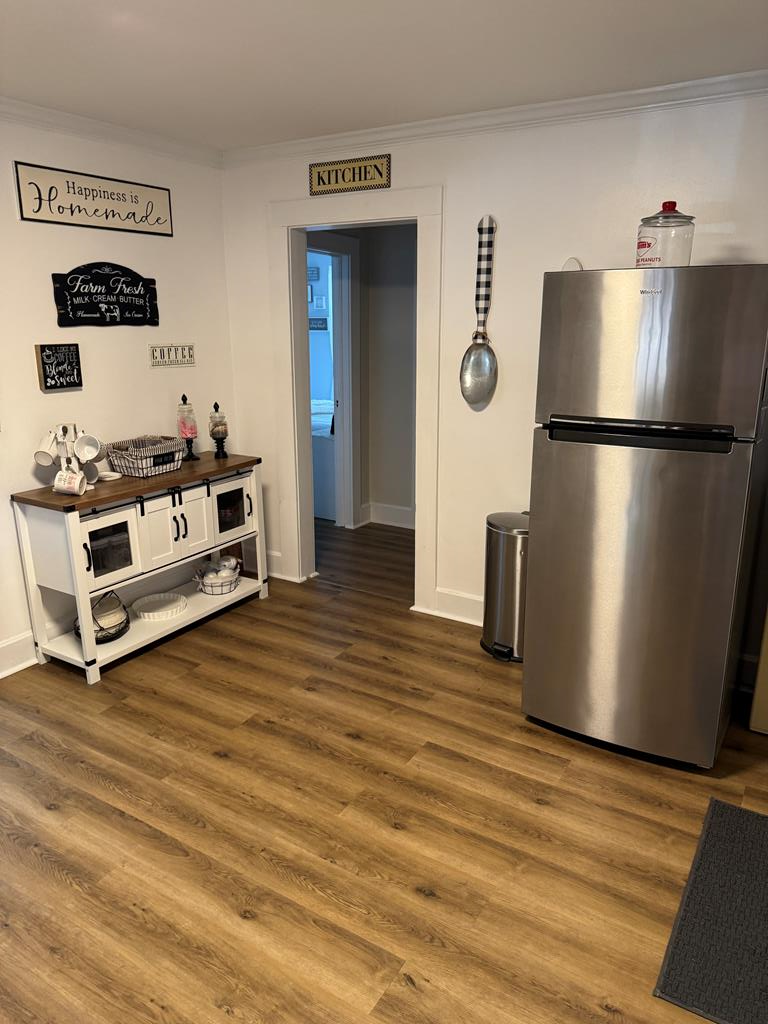 4367 Old Macon Road Columbus, GA 31907 - Photo 26 of 32 a kitchen with stainless steel appliances granite countertop a refrigerator and a stove