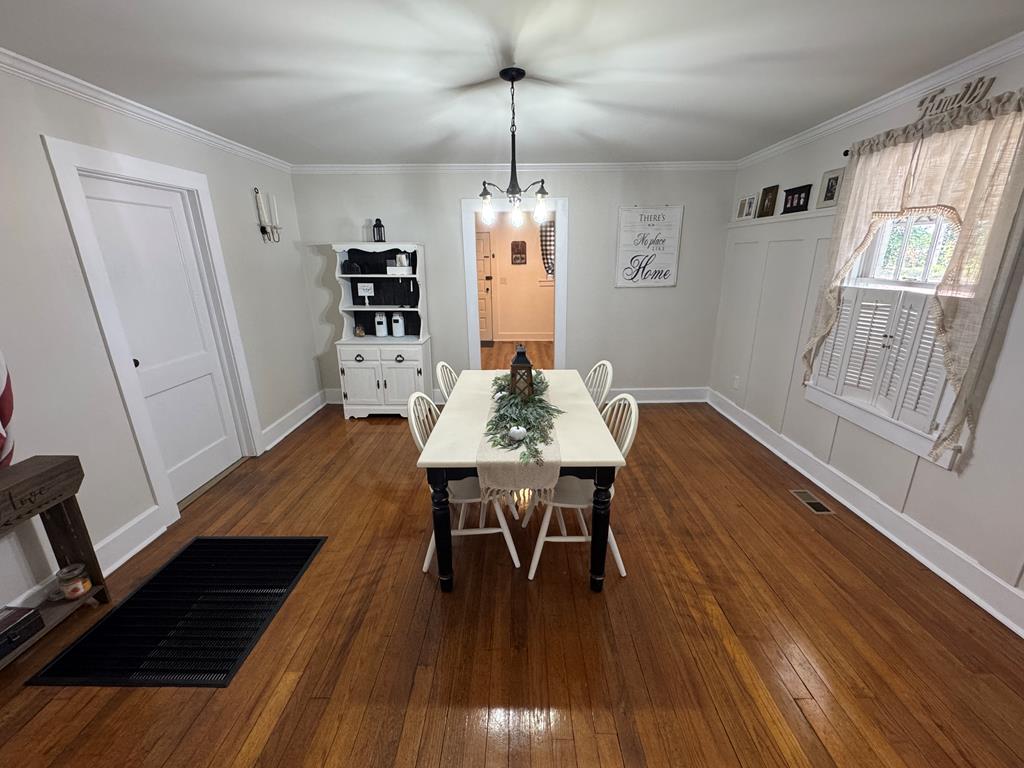 4367 Old Macon Road Columbus, GA 31907 - Photo 27 of 32 a view of a dining room with furniture window and wooden floor