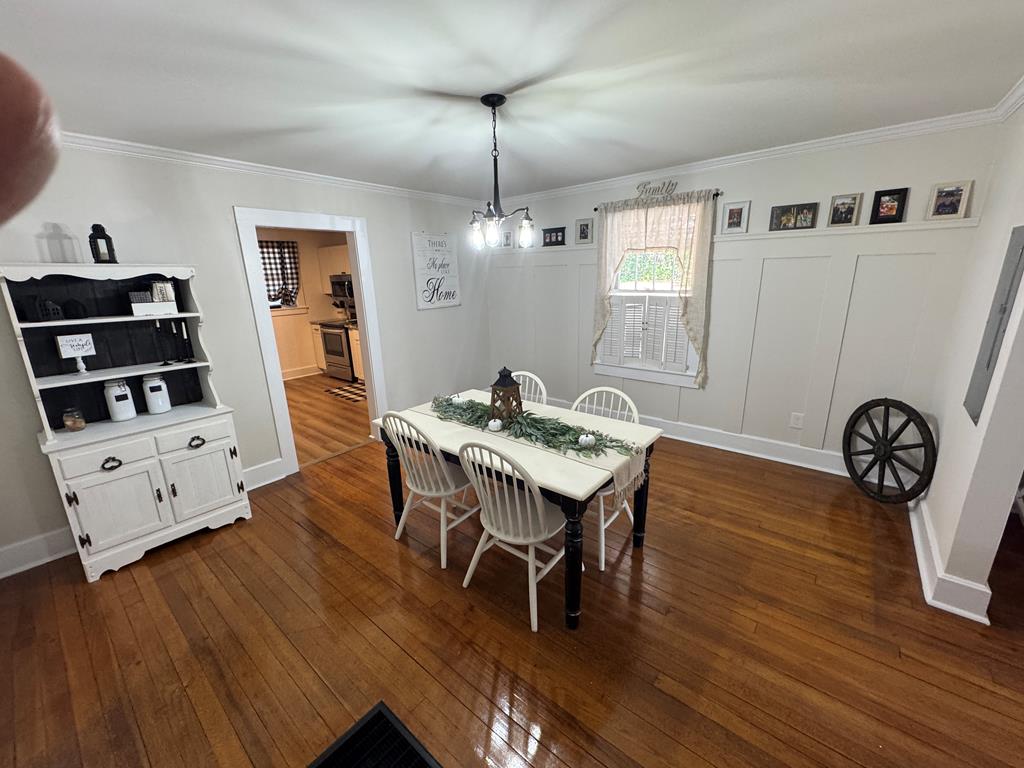 4367 Old Macon Road Columbus, GA 31907 - Photo 28 of 32 a view of a dining room with furniture and wooden floor