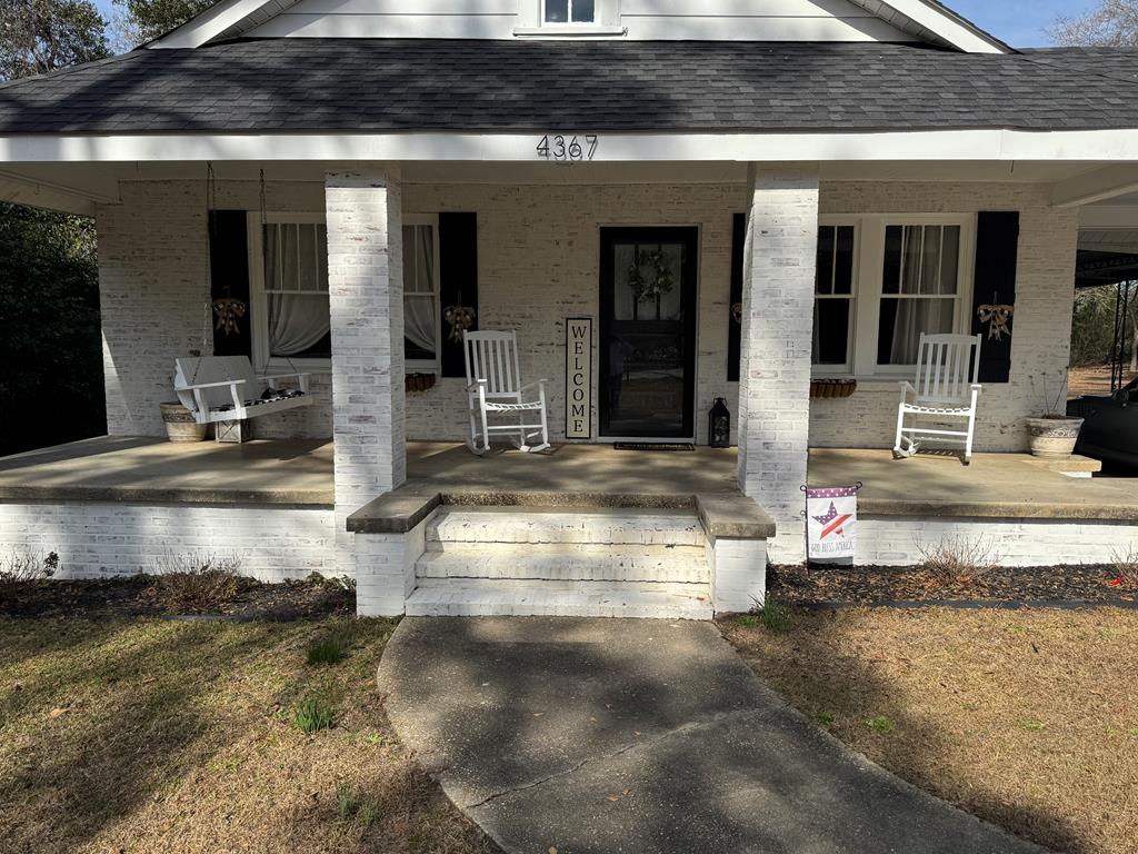 4367 Old Macon Road Columbus, GA 31907 - Photo 3 of 32 a living room with fireplace furniture and a rug
