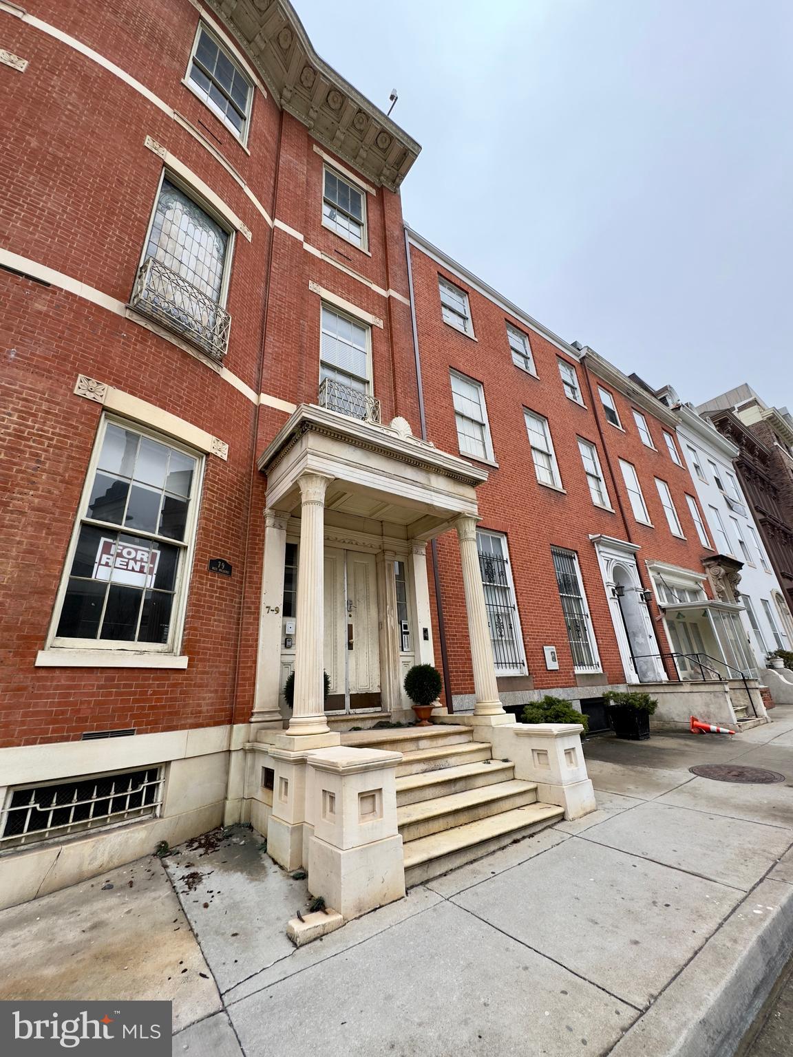7 West Mulberry Street, Unit 7 Baltimore, MD 21201 - Photo 1 of 16 a view of a building with a bench