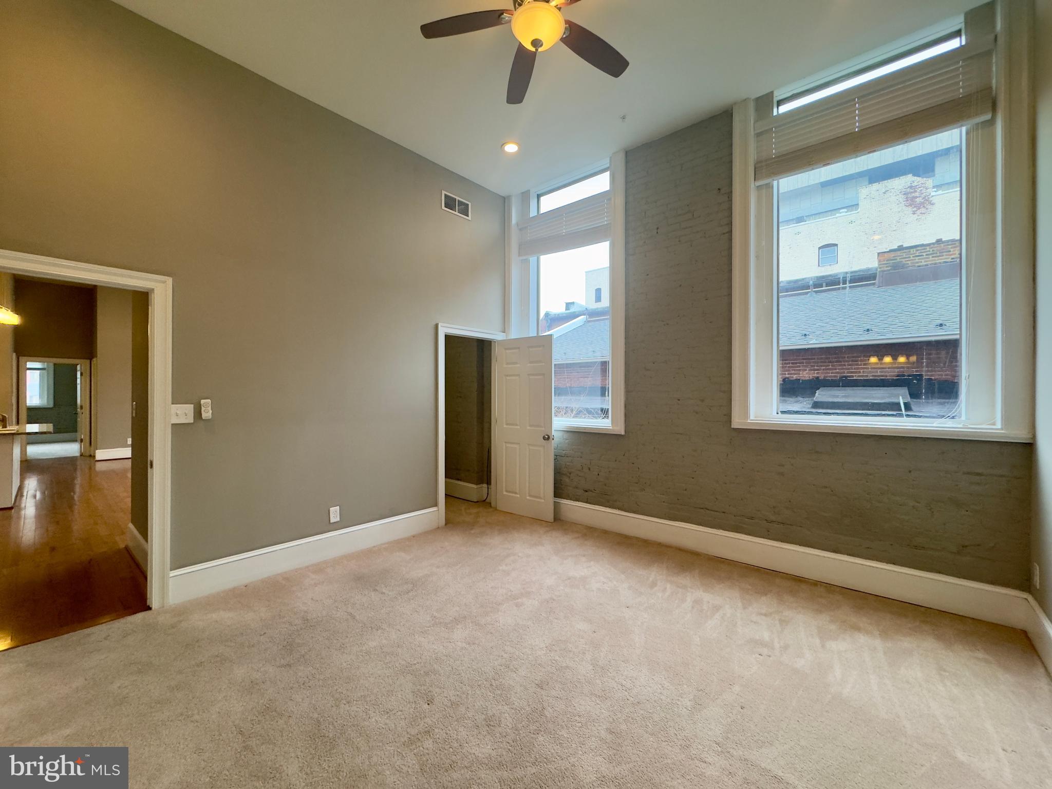 7 West Mulberry Street, Unit 7 Baltimore, MD 21201 - Photo 11 of 16 a view of an empty room with a window
