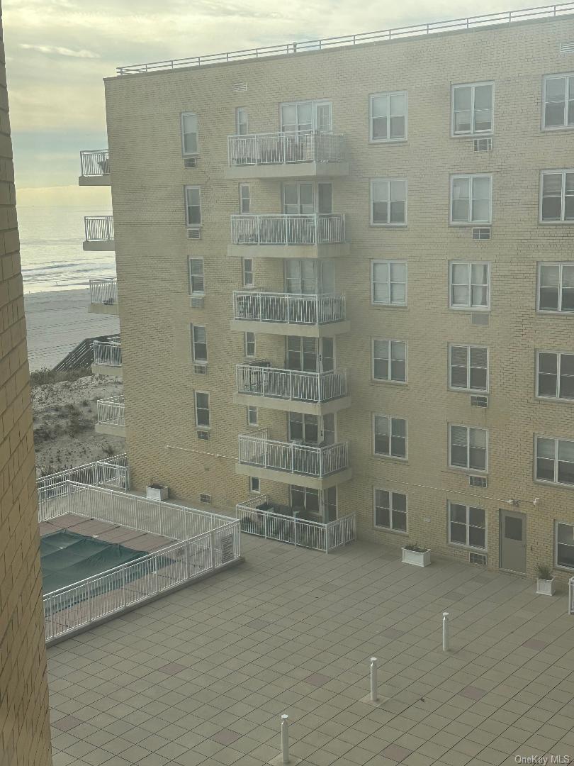 770 Shore Road, Unit 6EE Long Beach, NY 11561 - Photo 10 of 13 View of apartment building / complex with a water view