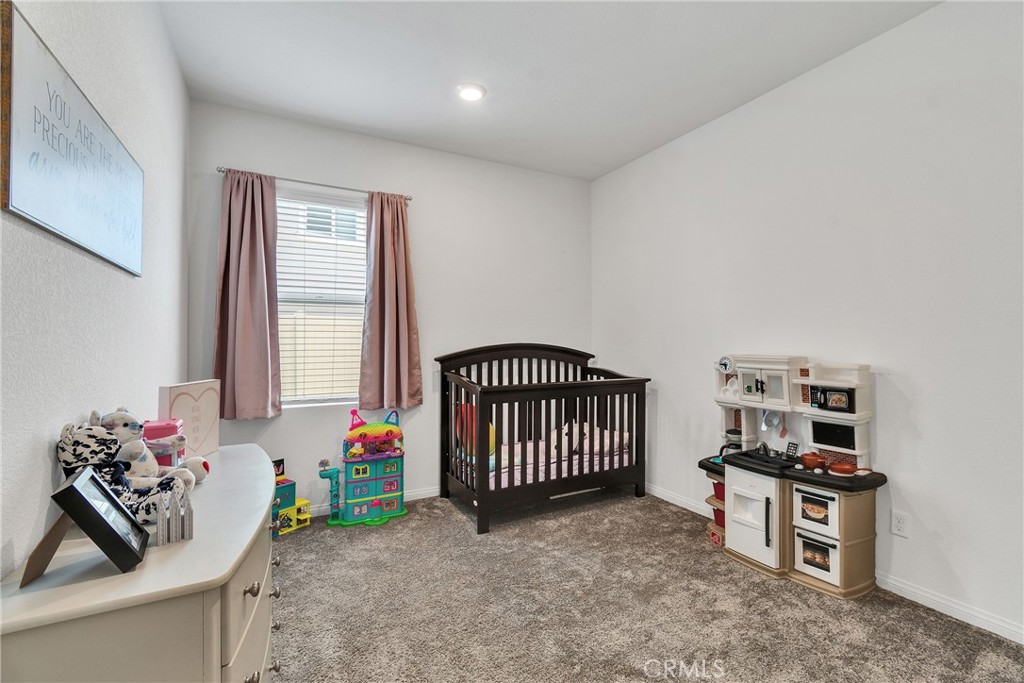 402 Appleton Way Perris, CA 92570 - Photo 19 of 34 a view of a livingroom with toys