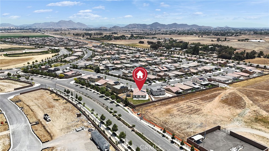 402 Appleton Way Perris, CA 92570 - Photo 6 of 34 an aerial view of residential houses with outdoor space