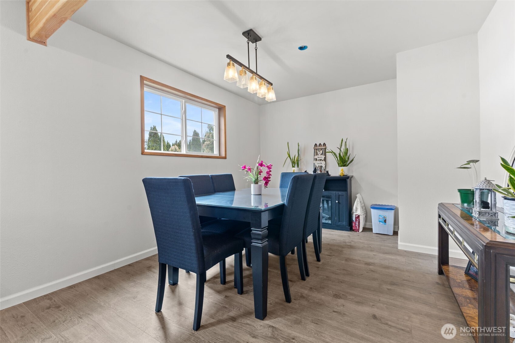 545 Davis Lake Road Morton, WA 98356 - Photo 11 of 32 a view of a dining room with furniture and wooden floor
