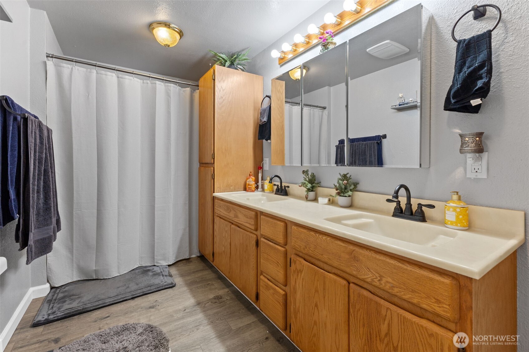 545 Davis Lake Road Morton, WA 98356 - Photo 17 of 32 a bathroom with a double vanity sink and a mirror