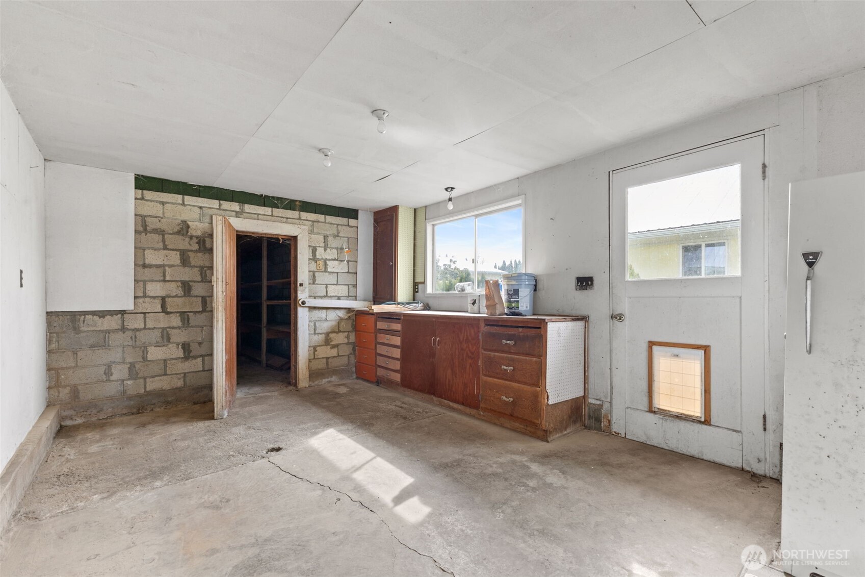 545 Davis Lake Road Morton, WA 98356 - Photo 24 of 32 a large bathroom with a large mirror vanity and shower
