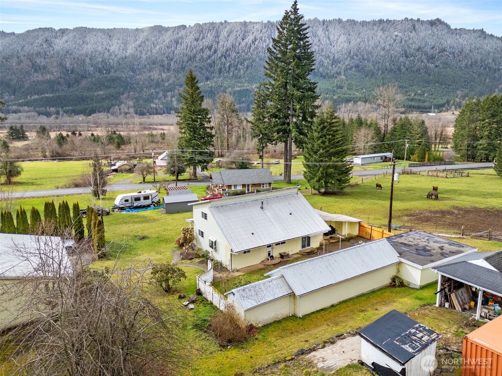 545 Davis Lake Road Morton, WA 98356 - Photo 31 of 32 a view of a swimming pool with a patio