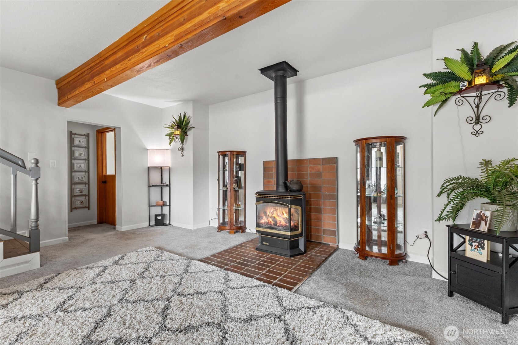 545 Davis Lake Road Morton, WA 98356 - Photo 7 of 32 a view of a livingroom with a flat screen tv and a fireplace