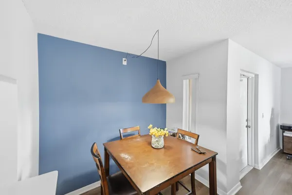 a bathroom with a sink vanity and mirror