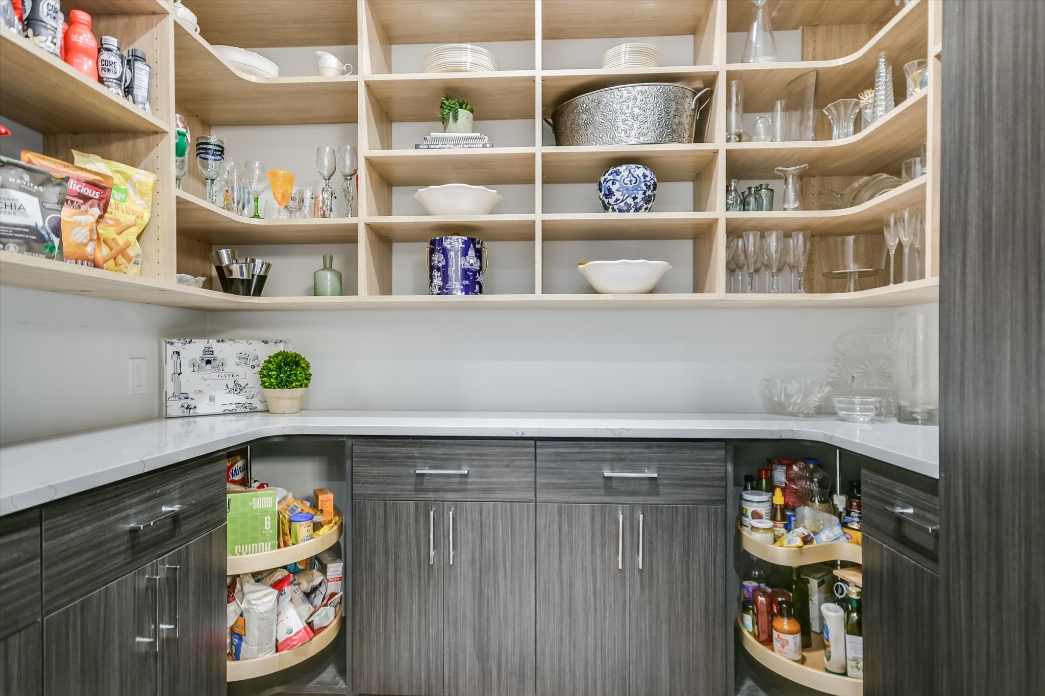 403 Ridgewood Road Austin, TX 78746 - Photo 12 of 34 a shelf with cup and plates