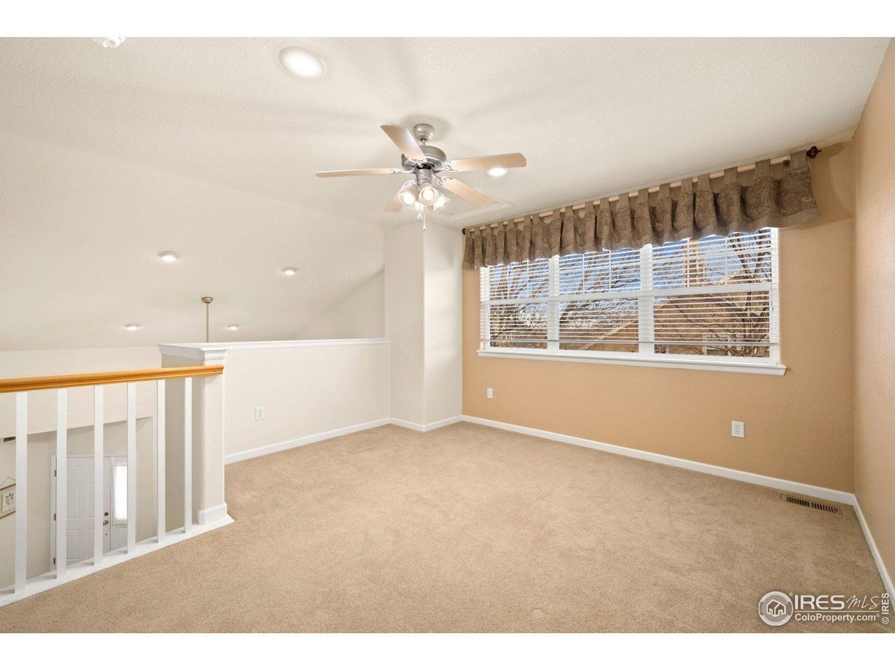 6608 West 3rd Street, Unit 61 Greeley, CO 80634 - Photo 9 of 16 a view of an empty room with a window