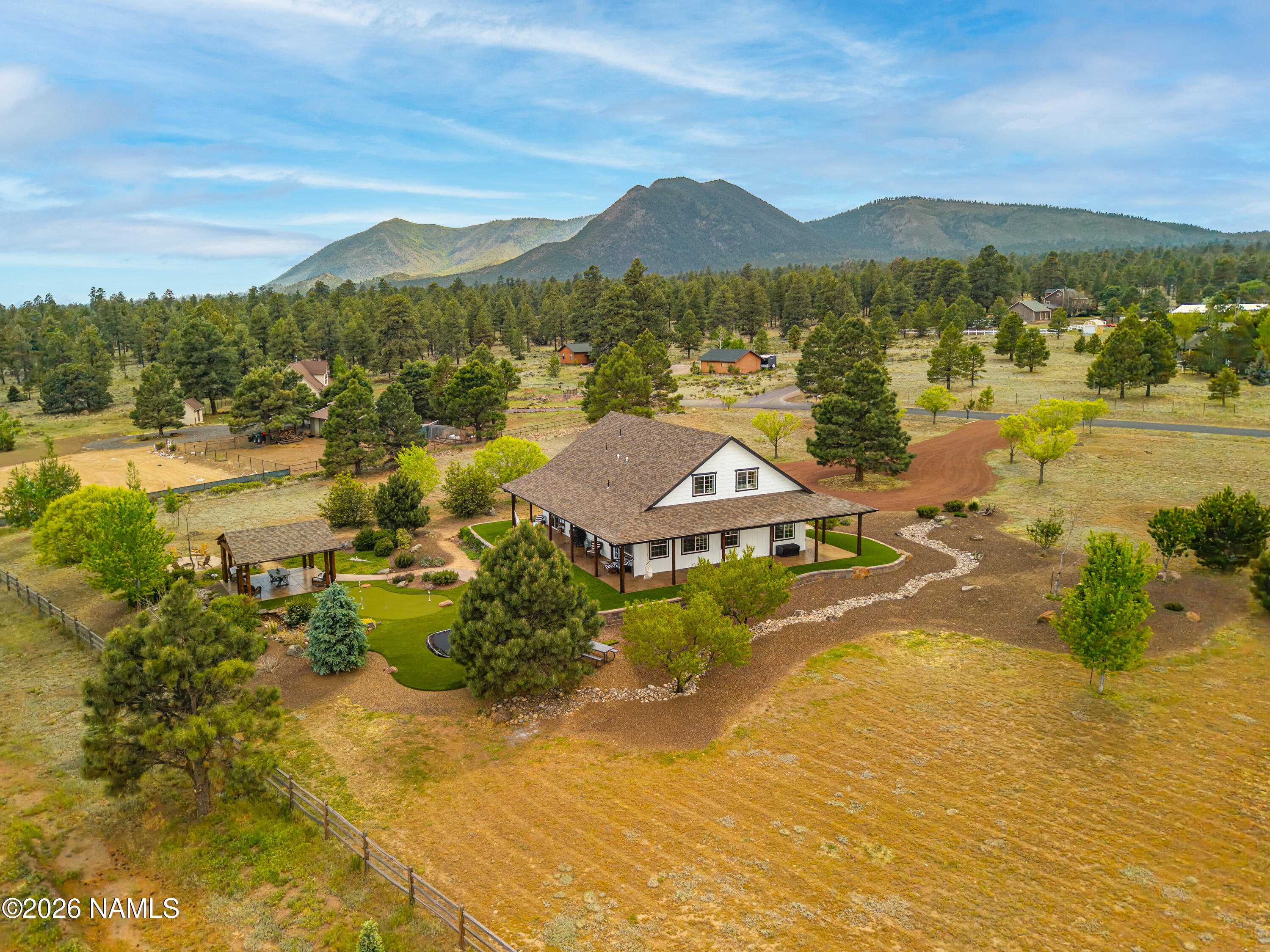 10833 Sage Road Flagstaff, AZ 86004 - Photo 41 of 45 a view of a lake with a mountain in the background