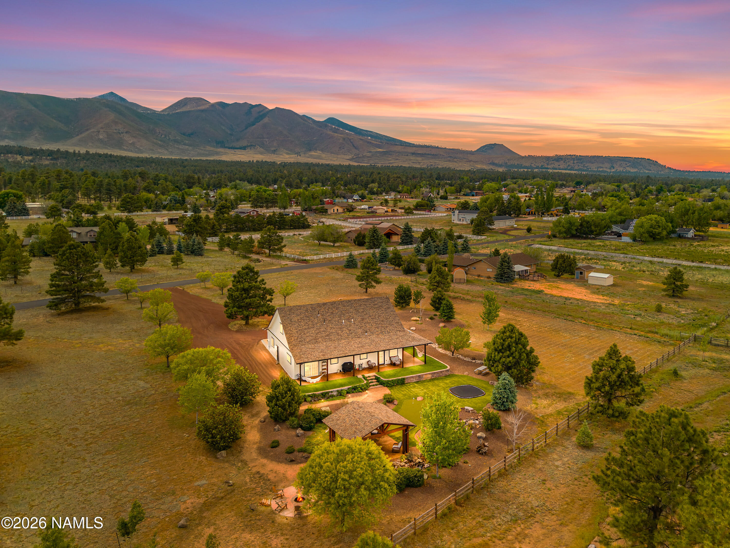 10833 Sage Road Flagstaff, AZ 86004 - Photo 42 of 45 a view of a lake with mountains in the background