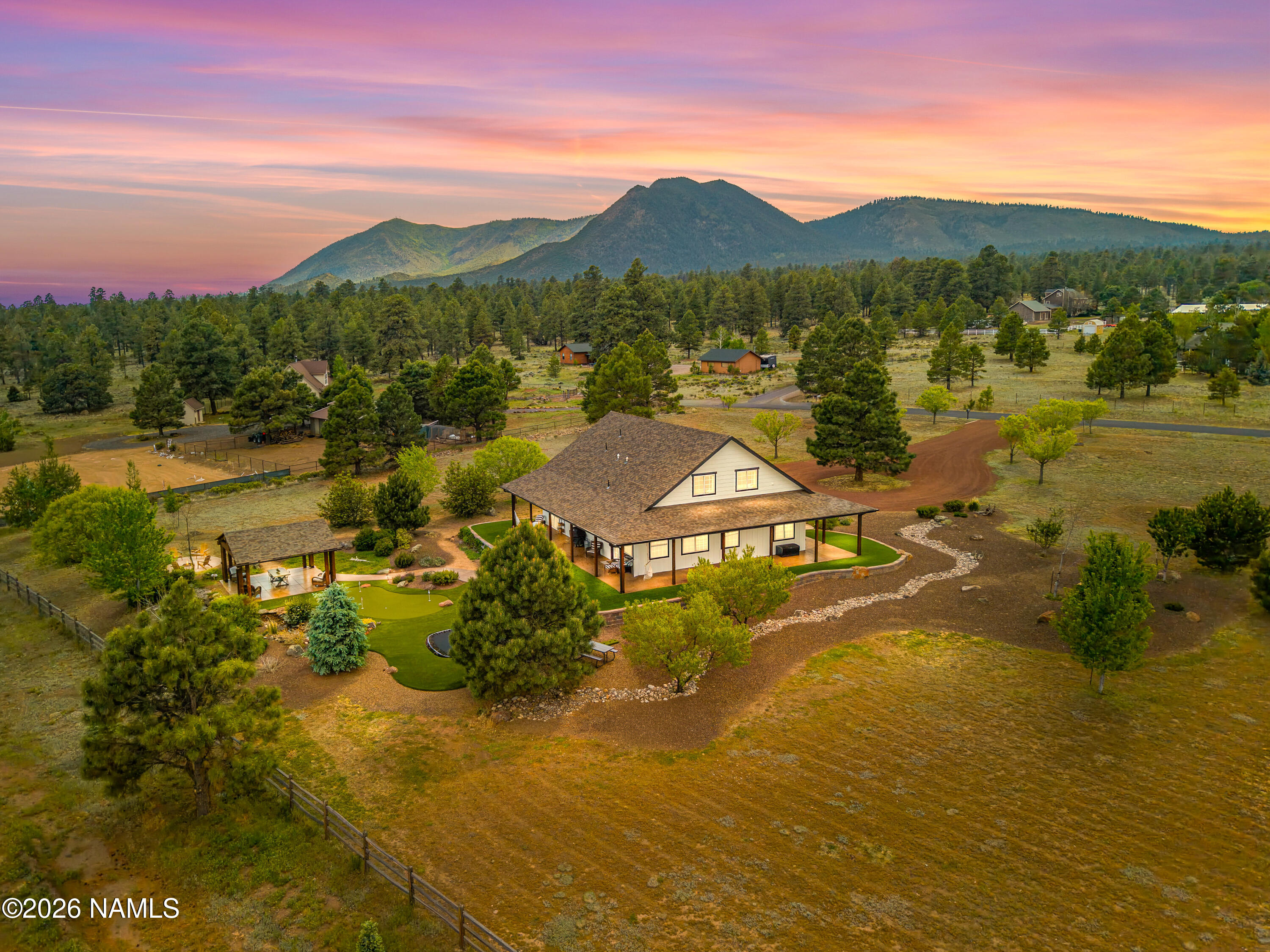 10833 Sage Road Flagstaff, AZ 86004 - Photo 43 of 45 a view of a lake with a mountain