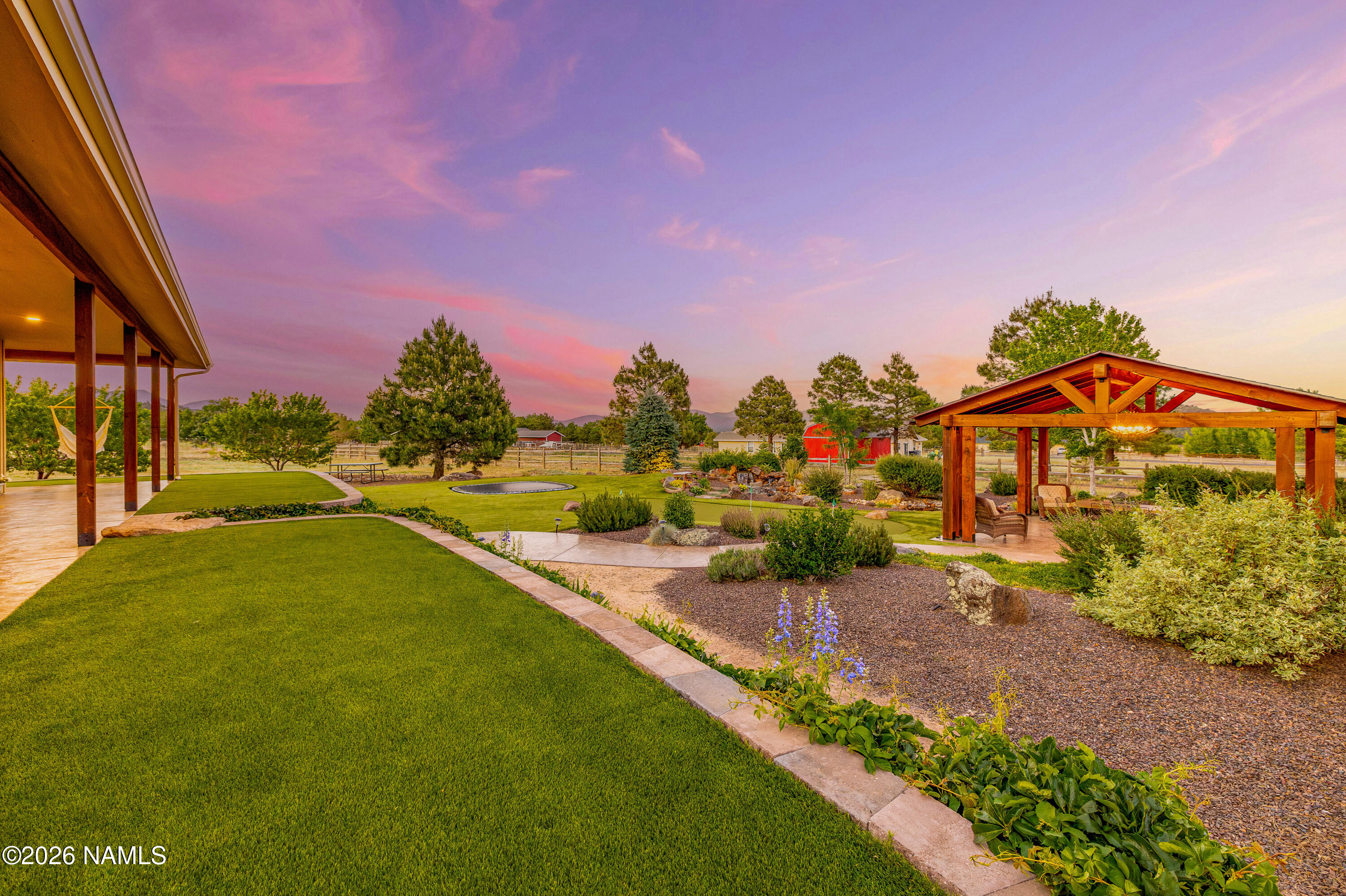 10833 Sage Road Flagstaff, AZ 86004 - Photo 6 of 45 Beautifully landscaped backyard
