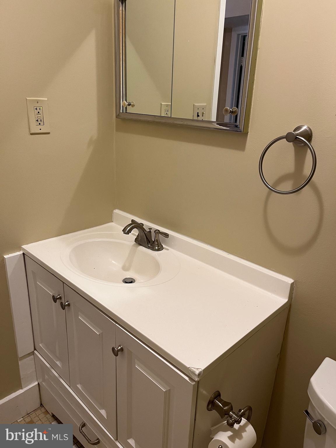 1508 Silver Court Hamilton, NJ 08690 - Photo 18 of 19 a bathroom with a sink and a mirror