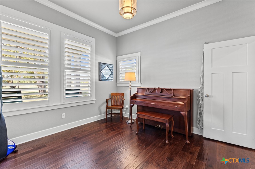 8355 Poison Oak Road, Unit H Temple, TX 76502 - Photo 32 of 48 a view of a workspace with furniture and a window