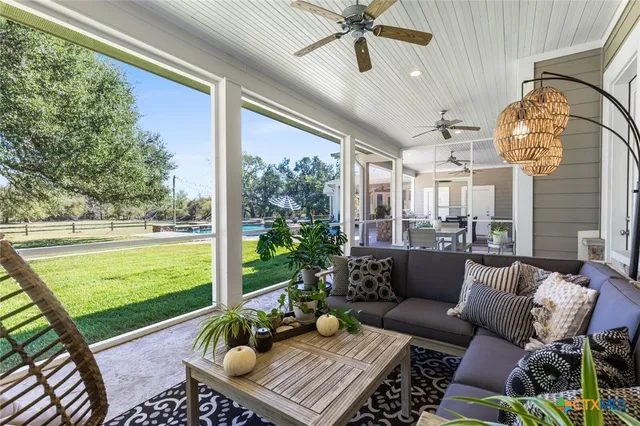 a outdoor living space with furniture and a garden
