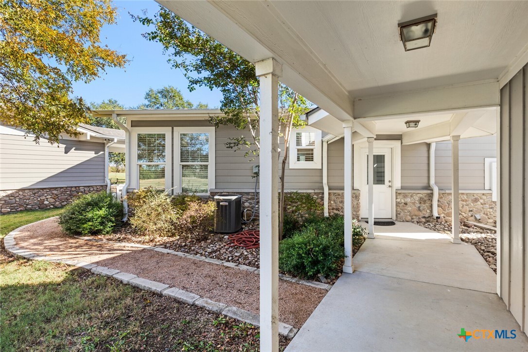 8355 Poison Oak Road, Unit H Temple, TX 76502 - Photo 46 of 48 a view of a garden with a patio