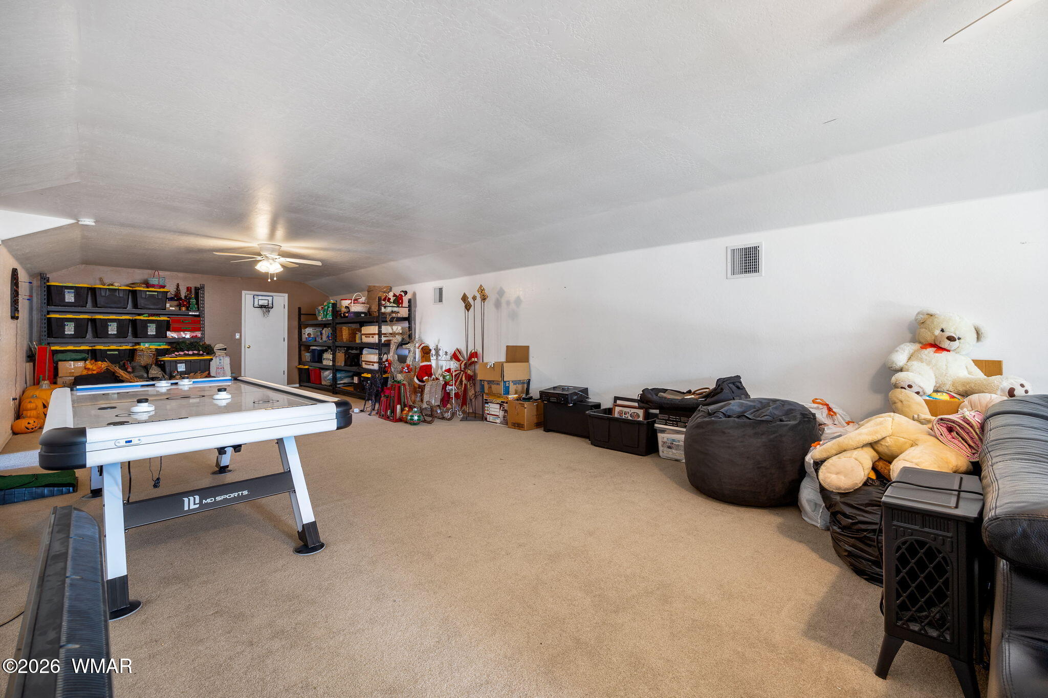 1940 Stonegate Way Heber, AZ 85928 - Photo 42 of 62 a room with furniture and gym equipment