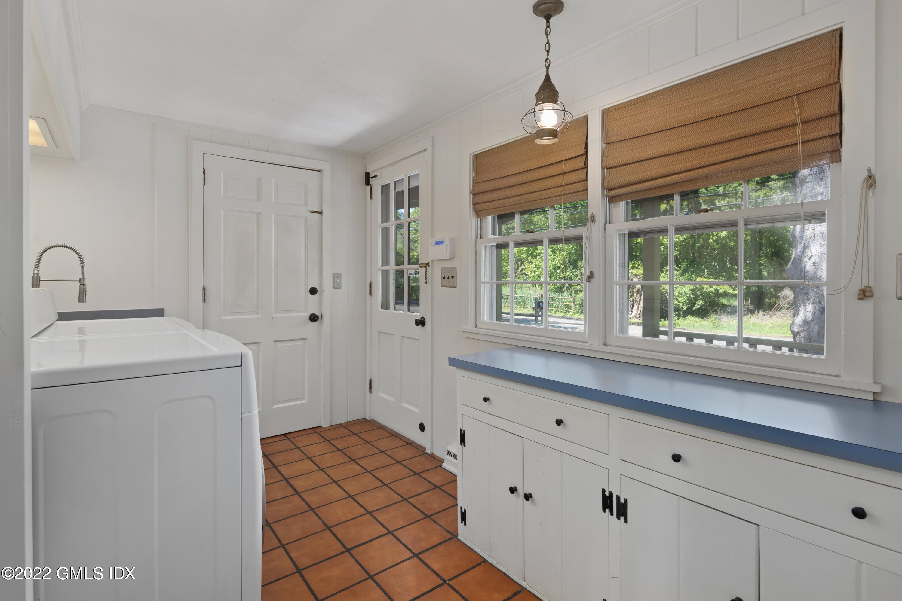 324 Haviland Road Stamford, CT 06903 - Photo 25 of 40 a room with a window and a washer dryer