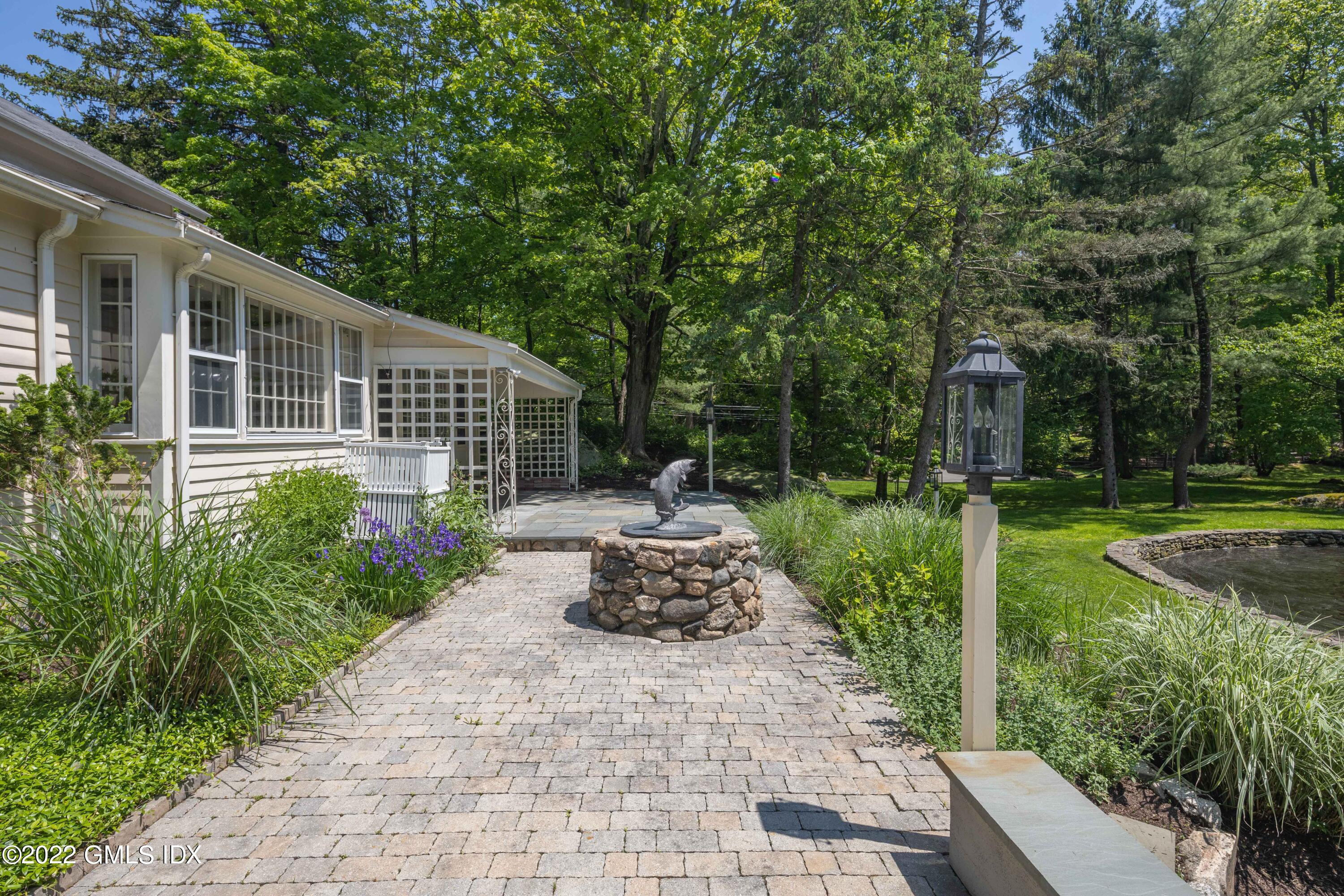 324 Haviland Road Stamford, CT 06903 - Photo 27 of 40 a front view of a house with a yard