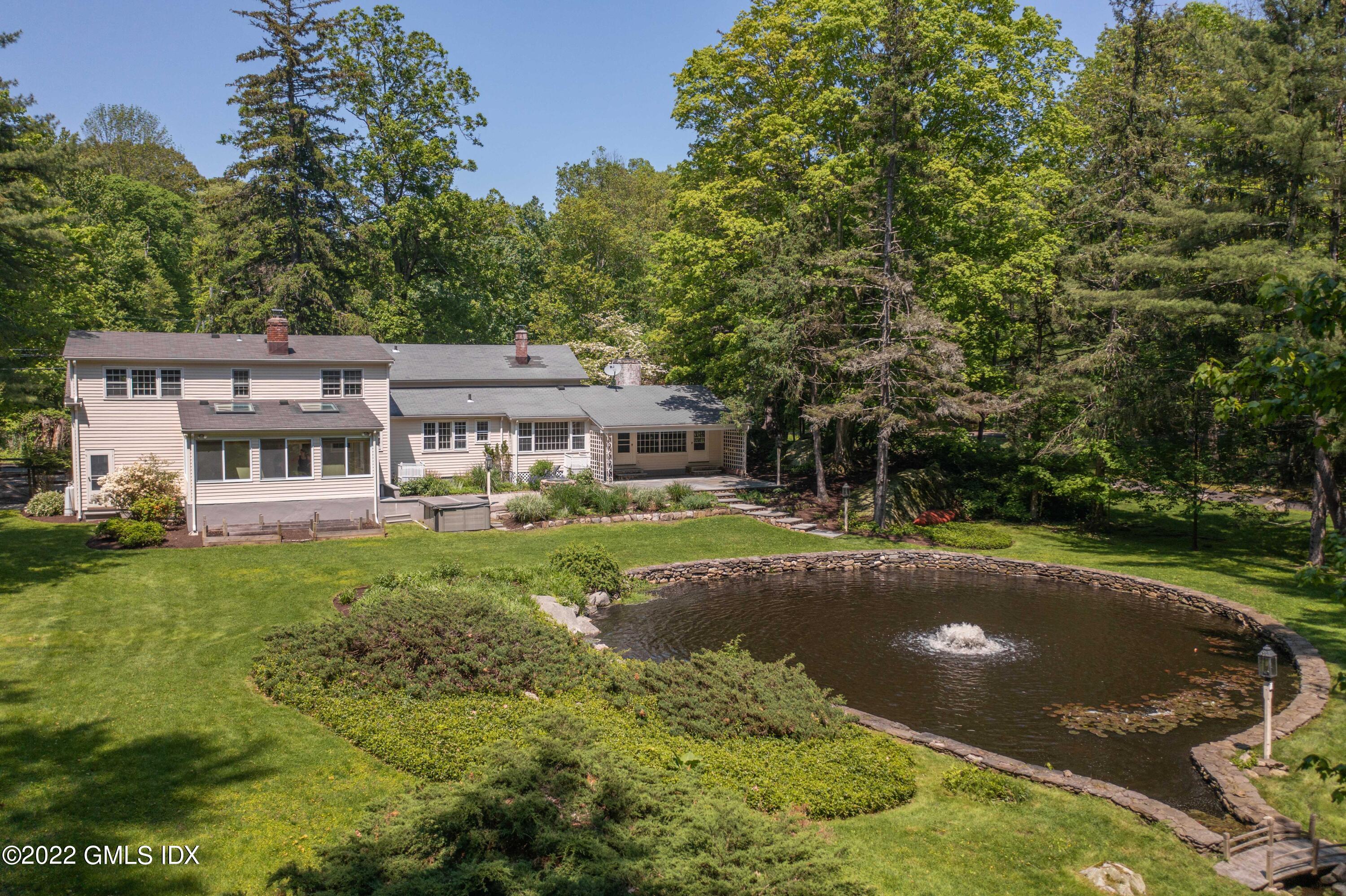 324 Haviland Road Stamford, CT 06903 - Photo 28 of 40 a view of a house with a big yard