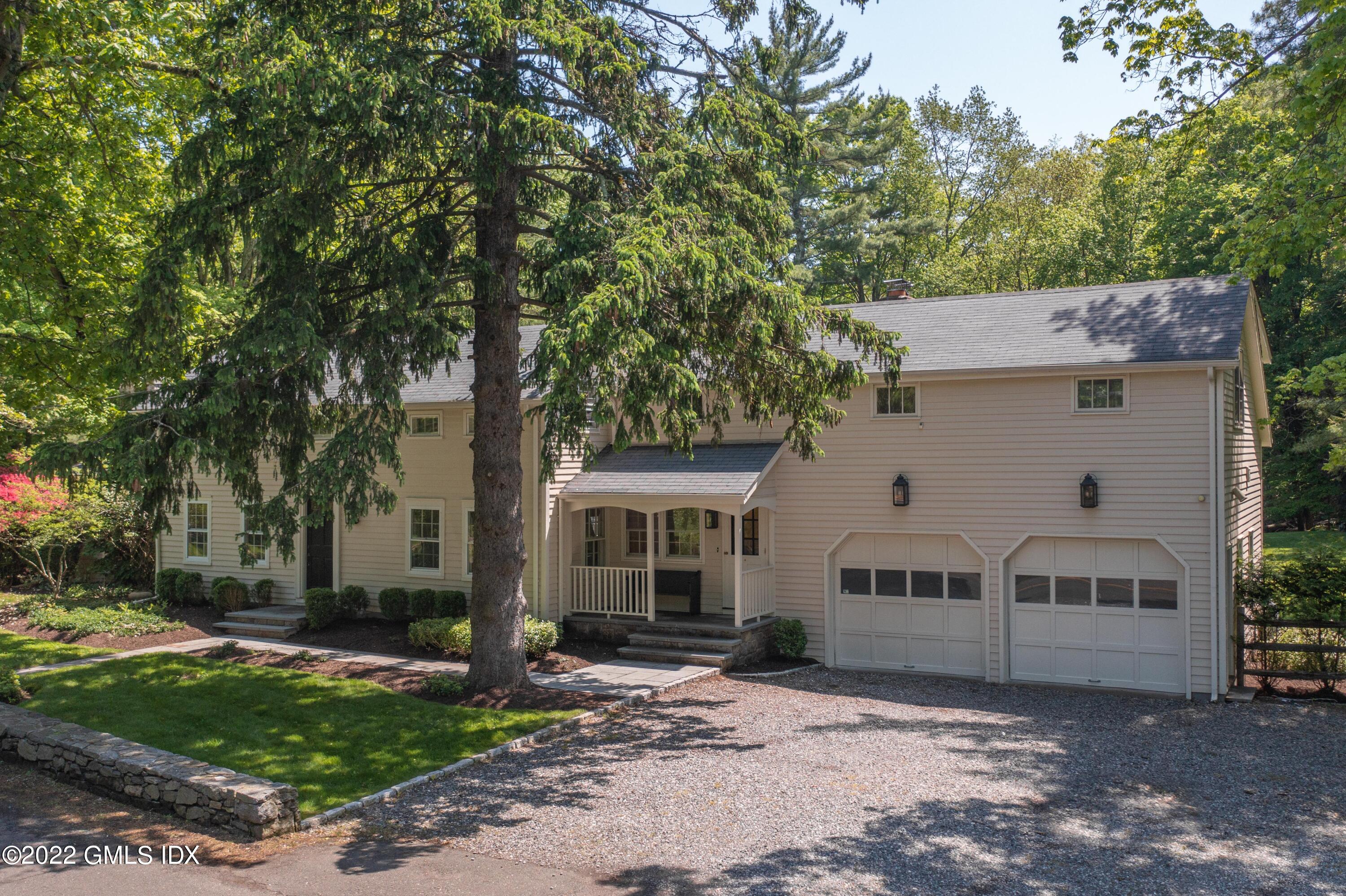 324 Haviland Road Stamford, CT 06903 - Photo 39 of 40 a view of a house with a yard