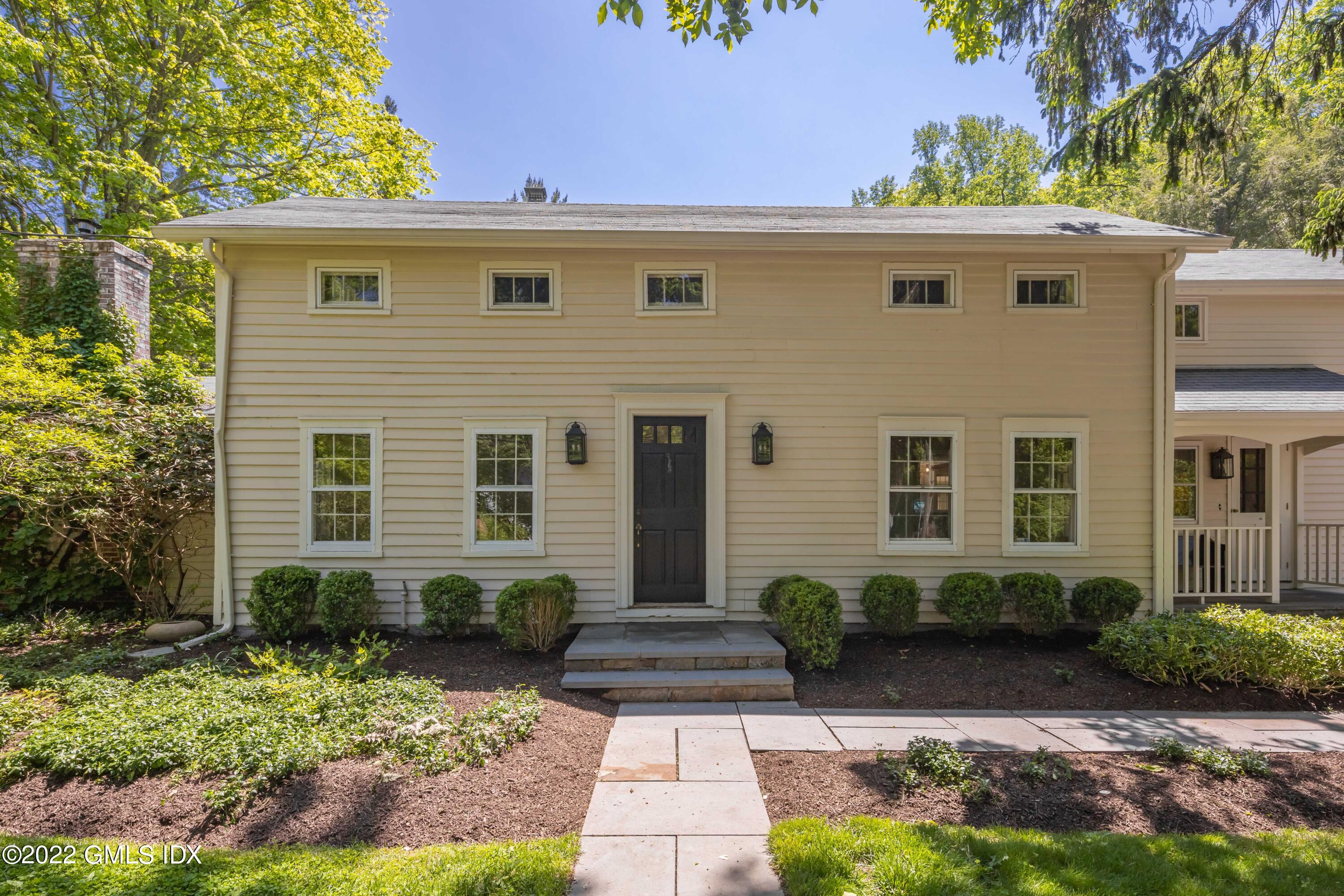 324 Haviland Road Stamford, CT 06903 - Photo 40 of 40 a front view of a house with garden