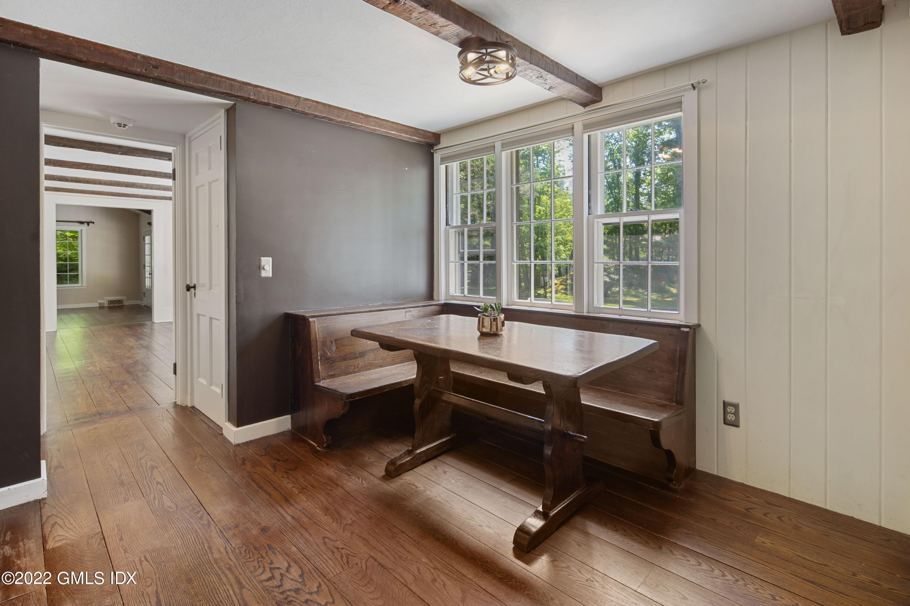 324 Haviland Road Stamford, CT 06903 - Photo 8 of 40 a reading room with wooden floor and furniture