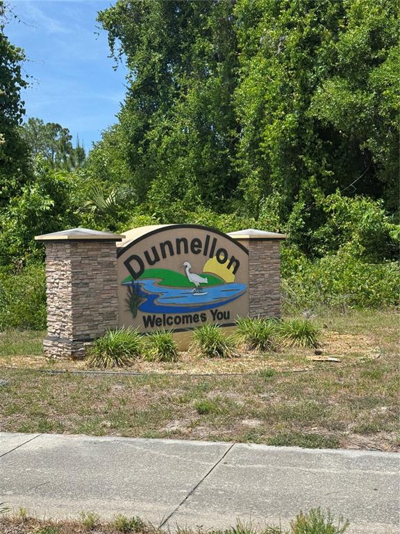 Southwest Beach Boulevard Dunnellon, FL 34433 - Photo 6 of 6 a view of outdoor space with garden and seating area
