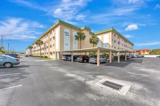 a view of a large building with a street