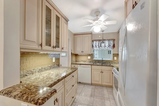a view of a bathroom from a hallway