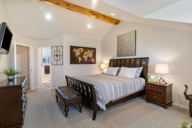 3598 North Huntsman Path, Unit 502 Eden, UT 84310 - Photo 18 of 43 Bedroom with vaulted ceiling with beams, light carpet, recessed lighting, and connected bathroom