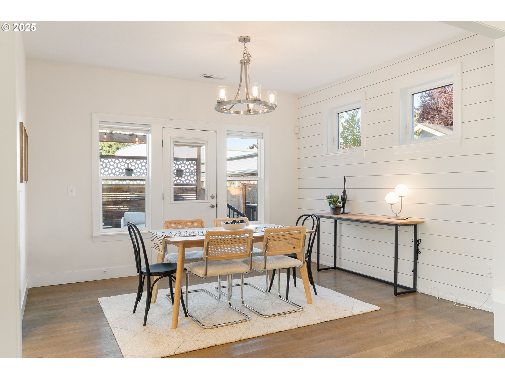 4735 Southeast Bush Street Portland, OR 97206 - Photo 18 of 47 a view of a dining room with furniture and window