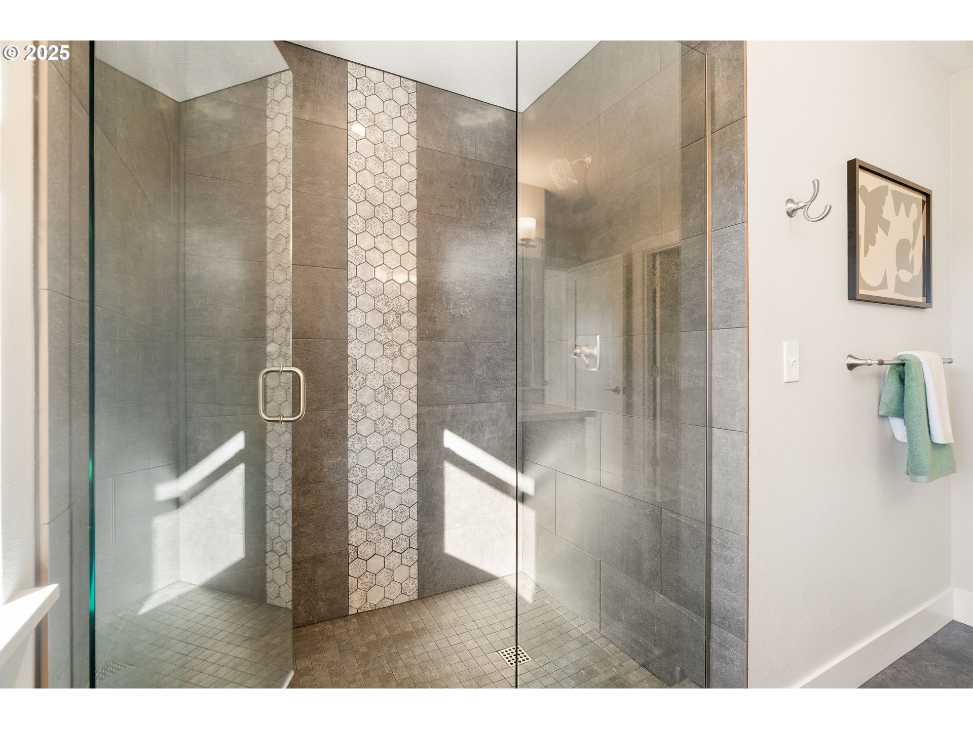 4735 Southeast Bush Street Portland, OR 97206 - Photo 26 of 47 a bathroom with a glass shower door