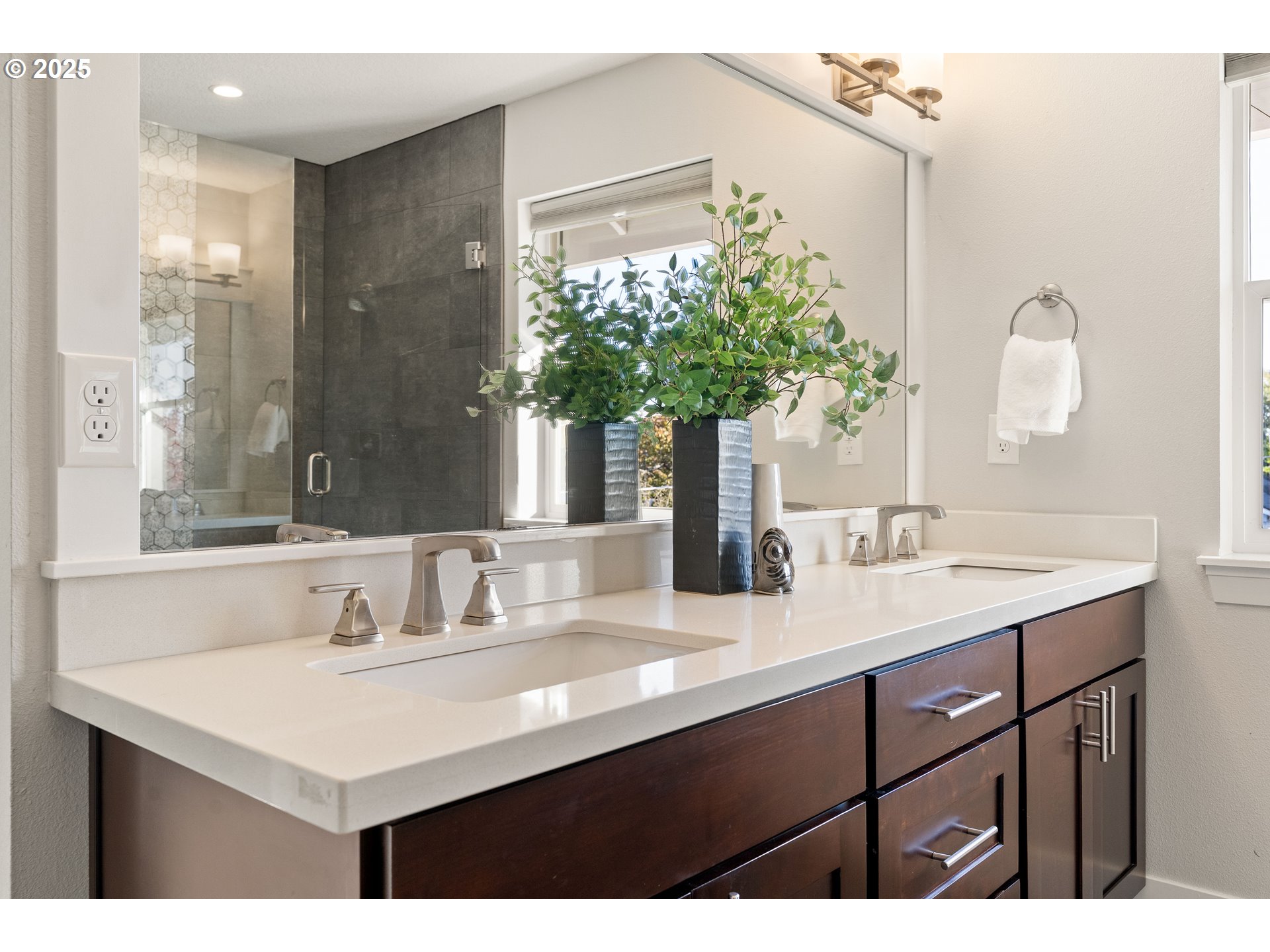 4735 Southeast Bush Street Portland, OR 97206 - Photo 27 of 47 a bathroom with a sink a vanity and a mirror