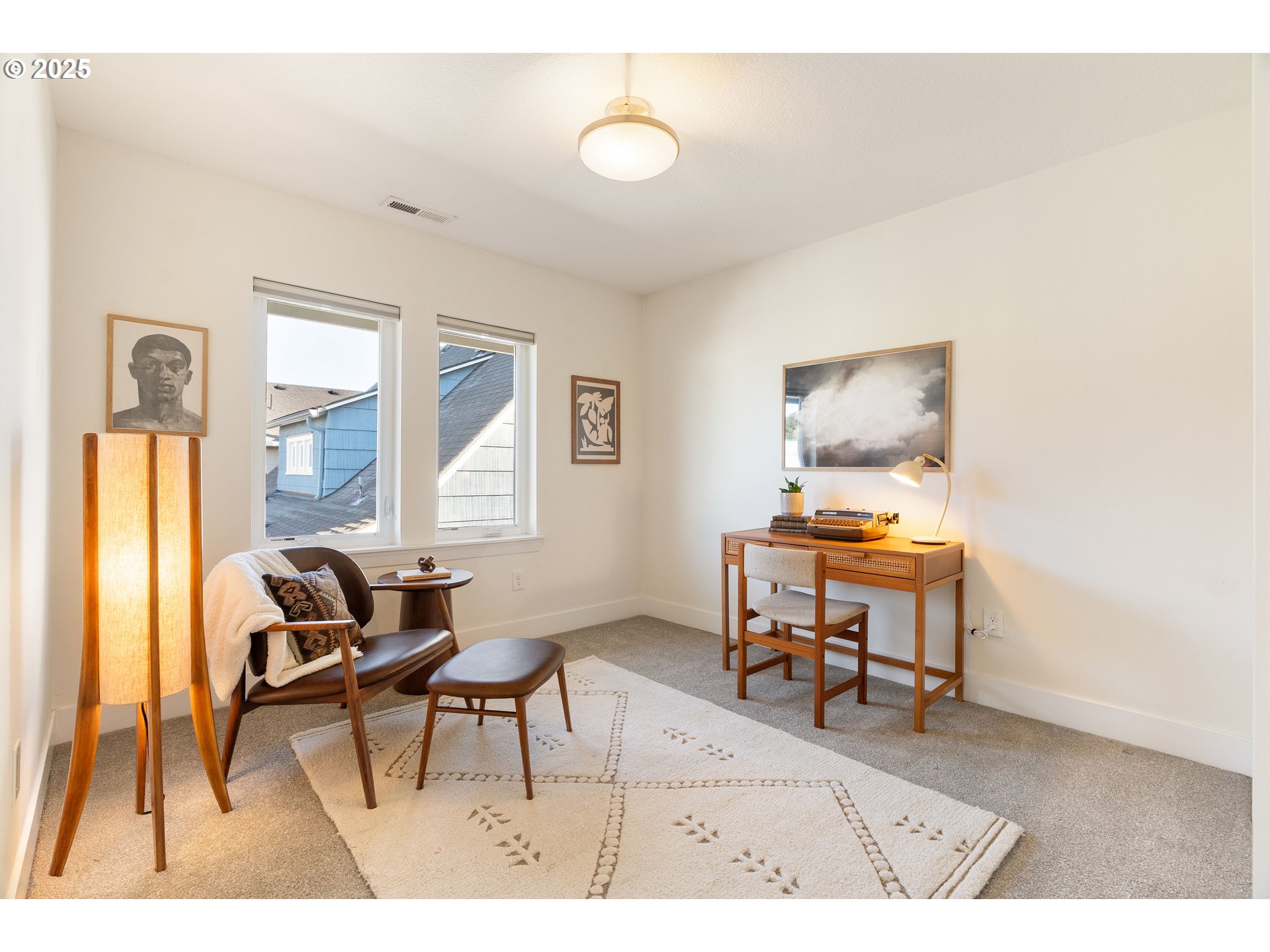4735 Southeast Bush Street Portland, OR 97206 - Photo 32 of 47 a living room with furniture and a flat screen tv
