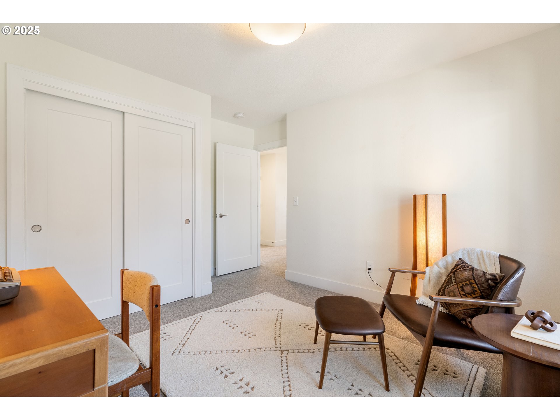4735 Southeast Bush Street Portland, OR 97206 - Photo 33 of 47 a living room with furniture and a chair