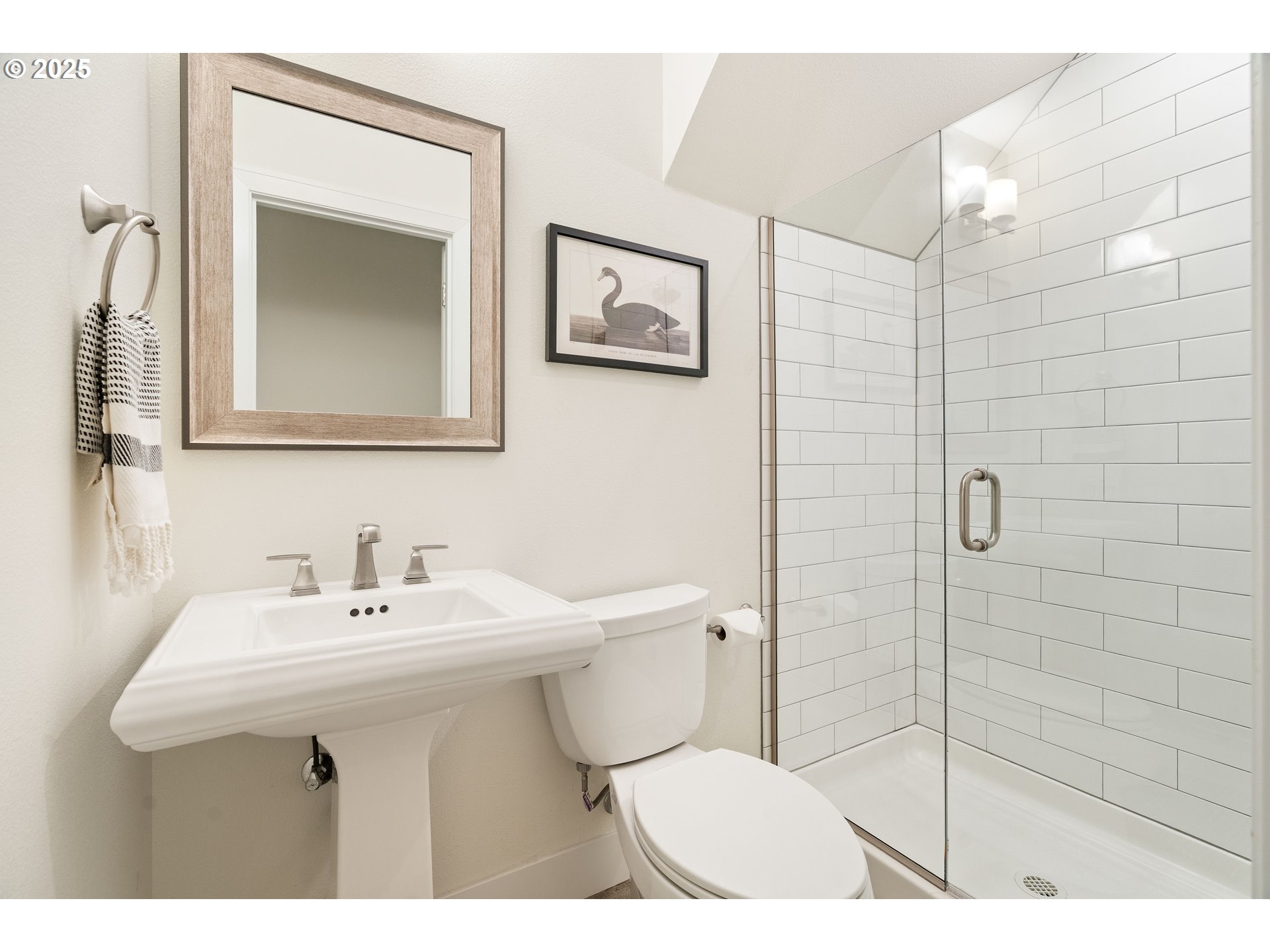 4735 Southeast Bush Street Portland, OR 97206 - Photo 34 of 47 a bathroom with a sink mirror and toilet